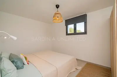 Letto o letti in una camera di Villa Thia