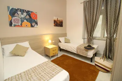 Letto o letti in una camera di Farri's Apartment