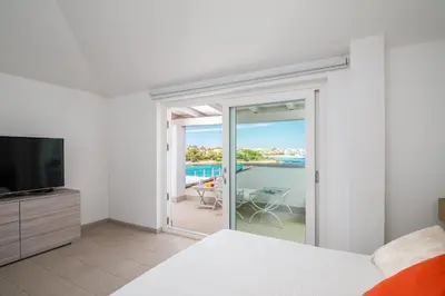 TV o dispositivi per l'intrattenimento presso Villa Bianca with a heated swimming pool