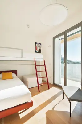 Letto o letti in una camera di Alfiere Arc Loft by Klodge