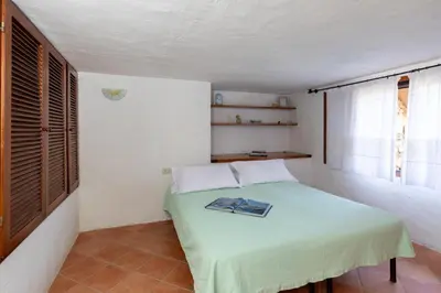 Letto o letti in una camera di Breeze of the Coast by Wonderful Italy