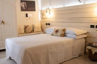 Letto o letti in una camera di Domo de Ciu Nenneddu