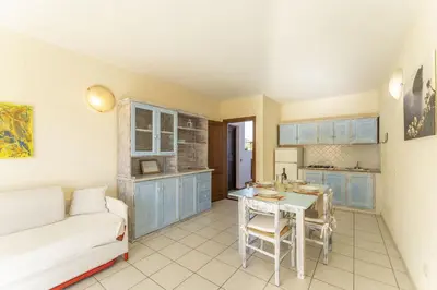 Cucina o angolo cottura di Golfo Aranci Apartments With Ac