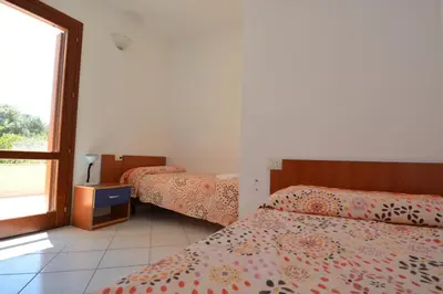 Letto o letti in una camera di Citai con splendida vista mare