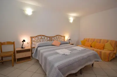 Letto o letti in una camera di Citai con splendida vista mare