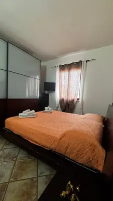 Letto o letti in una camera di Le residenze del mare bilocale