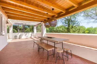 Balcone o terrazza di Villa con accesso privato alla spiaggia di Cala Brandinchi - 8 posti letto