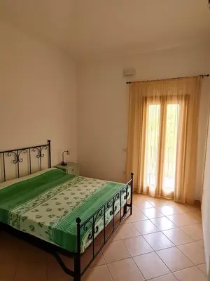 Letto o letti in una camera di Dimora San Pietro