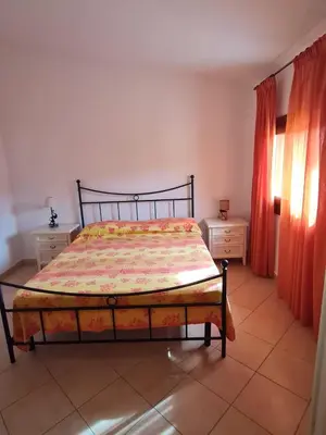 Letto o letti in una camera di Dimora San Pietro