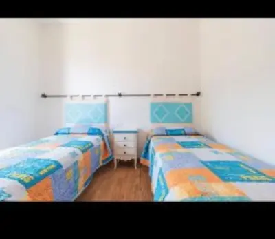 Letto o letti in una camera di Casa Nicola