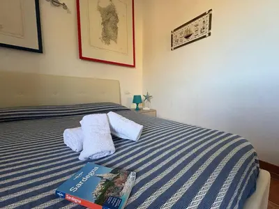 Letto o letti in una camera di AffittaSardegna- Casa Costa