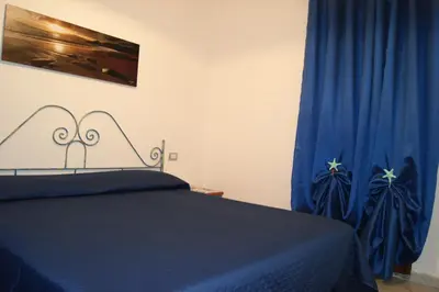Letto o letti in una camera di AME house two