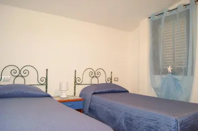 Letto o letti in una camera di AME house two