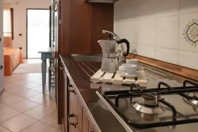 Cucina o angolo cottura di Violet Residence In Orosei