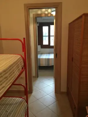 Letto o letti in una camera di Villetta DESSANAI