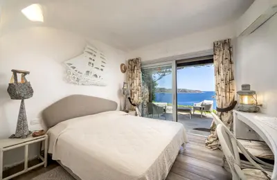 Letto o letti in una camera di VILLA DOminore - Punta Est, Capo Coda Cavallo - San Teodoro