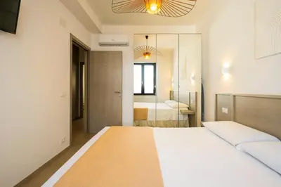 Letto o letti in una camera di Casa Salsedine Luxury breathtaking view & SPA