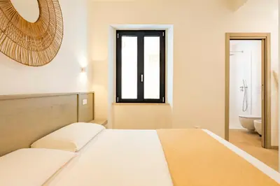 Letto o letti in una camera di Casa Salsedine Luxury breathtaking view & SPA