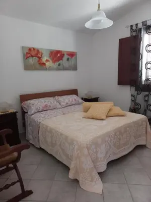 Letto o letti in una camera di Chicchiritanos