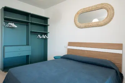 Letto o letti in una camera di Loft al Molo by Wonderful Italy