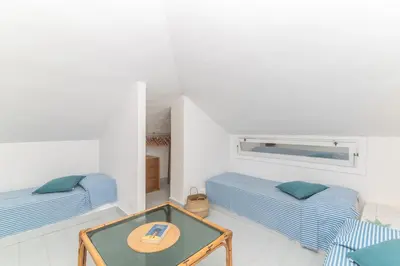 Letto o letti in una camera di Vista Golfo 1