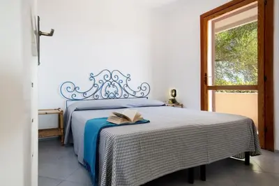 Letto o letti in una camera di Vista Golfo 2