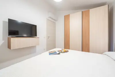 Letto o letti in una camera di AffittaSardegna- Villetta Meraviglia