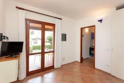 TV o dispositivi per l'intrattenimento presso Villetta Perla Marina 2