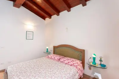 Letto o letti in una camera di Villetta Perla Marina