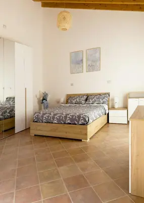 Letto o letti in una camera di Modern and Historical Refuge, 5 min from the Sea