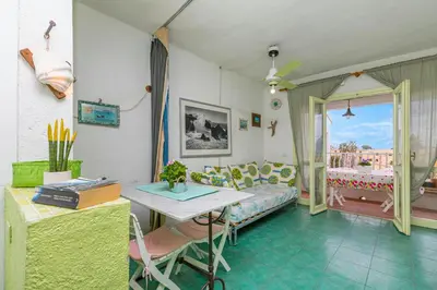 Area soggiorno di Il Vecchio Faro A42 Close To The Beach - Happy Rentals