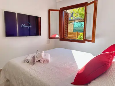 Letto o letti in una camera di Casa Vacanze Budoni - Sandalia