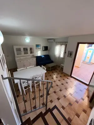 TV o dispositivi per l'intrattenimento presso Grazioso trilocale a Porto Ottiolu