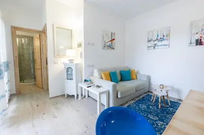 Area soggiorno di AD Veronese Apartment