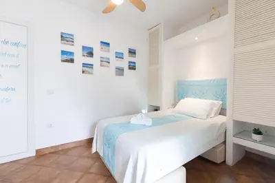 Letto o letti in una camera di AD Suite Ventimiglia