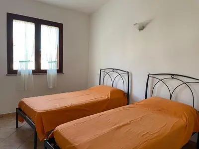 Letto o letti in una camera di Sa Costa