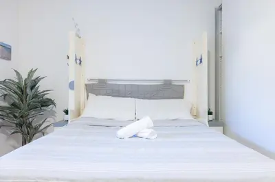 Letto o letti in una camera di AD Sibilla Apartment