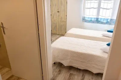 Letto o letti in una camera di Sa dommo de Maria