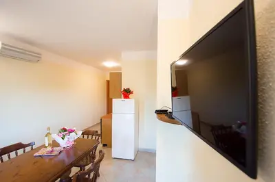 TV o dispositivi per l'intrattenimento presso Appartamenti Sole e Mare