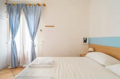 Letto o letti in una camera di Casa Pranos