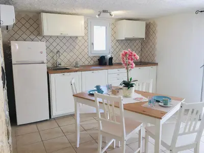 Cucina o angolo cottura di Beach House Ilaria Acquamarina Apt