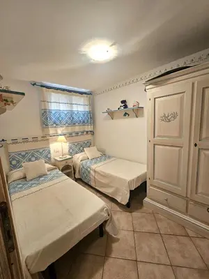 Letto o letti in una camera di Villetta Porto San Paolo