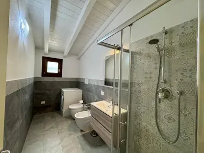 Bagno di CASA SAS ENAS trilocale indipendente -Ammentos Posada -