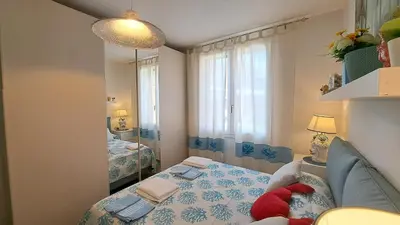 Letto o letti in una camera di Harry's House San Teodoro con piscina privata