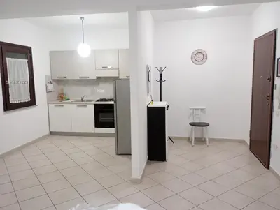 Cucina o angolo cottura di La Casa di Rossella nel cuore della città , Downtown spacious apartment