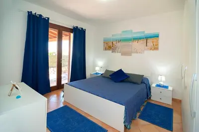 Letto o letti in una camera di Appartamento vicino alla spiaggia -G-