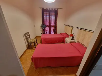 Letto o letti in una camera di Casa Vacanze Sa Petra Ruja La Caletta di Siniscola