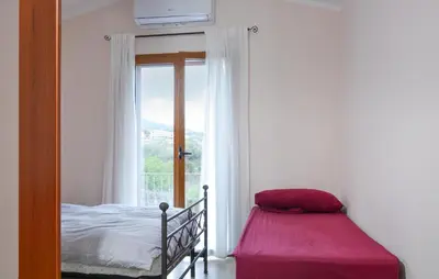Letto o letti in una camera di Awesome Home In Malamuri With Wifi