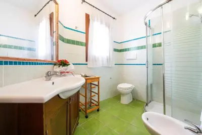 Bagno di Cozy veranda retreat near Budoni