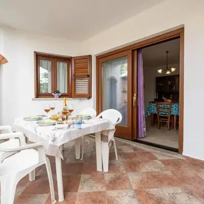 Cozy veranda retreat near Budoni